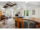 Kitchen featuring stainless steel appliances, wood countertops, and a view into living room at 4235 Howie Cir, Charlotte, NC 28205