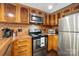 Stainless steel appliances and wood countertops are the focal point of this kitchen at 4235 Howie Cir, Charlotte, NC 28205
