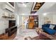 Open living room and kitchen featuring high ceilings and lots of natural light at 4235 Howie Cir, Charlotte, NC 28205