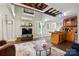 Bright open floor plan with modern living room open to a warm, inviting kitchen at 4235 Howie Cir, Charlotte, NC 28205