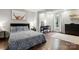 Spacious main bedroom with dark wood floors and an adjacent home office space at 4235 Howie Cir, Charlotte, NC 28205