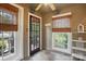 Bright sunroom with tile floors, bamboo shades and plenty of natural light at 4235 Howie Cir, Charlotte, NC 28205