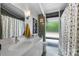 Modern bathroom with clean lines, white vanity, and natural light from the large window at 447 Merwick Cir, Charlotte, NC 28211