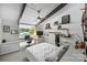Bright bedroom with a built-in desk, open shelves, and large windows offering peaceful views at 447 Merwick Cir, Charlotte, NC 28211