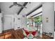 Bright dining area with modern lighting and views of the pool, perfect for gatherings at 447 Merwick Cir, Charlotte, NC 28211