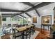Dining room with open concept featuring hardwood floors and large windows at 447 Merwick Cir, Charlotte, NC 28211