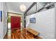 Entryway features hardwood floors, skylights, and modern decor at 447 Merwick Cir, Charlotte, NC 28211