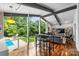 Bright living space with large windows overlooking the pool and backyard at 447 Merwick Cir, Charlotte, NC 28211