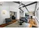 Comfortable living area with a modern sofa, stylish rug, and views into other rooms at 447 Merwick Cir, Charlotte, NC 28211
