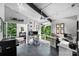 Bright office featuring dual work stations and large windows with views of lush foliage at 447 Merwick Cir, Charlotte, NC 28211