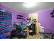 This purple bedroom features unique shelves and room for personalization at 514 S Martin St, Shelby, NC 28150