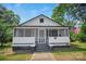 Charming home featuring a screened porch, offering a cozy and inviting outdoor living space at 514 S Martin St, Shelby, NC 28150