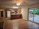 Open kitchen with granite counters, wood cabinets, and stainless steel appliances at 520 Crestview Dr, Albemarle, NC 28001