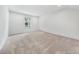 Large bedroom with neutral carpet and a bright window letting in natural light at 5366 Meadowcroft Way, Fort Mill, SC 29708