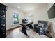 Well-lit home office with a decorative desk and comfortable seating at 5366 Meadowcroft Way, Fort Mill, SC 29708