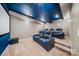 Home theater with comfortable seating, projector, and a large screen at 5366 Meadowcroft Way, Fort Mill, SC 29708