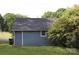 View of the back exterior of the home, showcasing its simple design and compact footprint at 614 Goldsboro Ave, Statesville, NC 28677