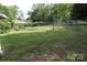 A spacious fenced backyard area, ideal for outdoor activities, recreation and more at 614 Goldsboro Ave, Statesville, NC 28677