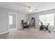 Bedroom featuring neutral colors, a ceiling fan, and a workspace at 6309 Crosshall Pl, Waxhaw, NC 28173
