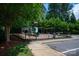Fenced playground with a slide, climbing structures, and swings, providing a safe play area for children at 6309 Crosshall Pl, Waxhaw, NC 28173