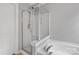 A pristine bathroom features a glass-enclosed shower, blending style with practical design at 6309 Crosshall Pl, Waxhaw, NC 28173