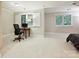 Bedroom featuring plantation shutters and ample natural light at 6647 Gaywind Dr, Charlotte, NC 28226