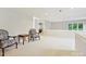 Inviting bonus room with a view of the outside, perfect for relaxing and entertaining at 6647 Gaywind Dr, Charlotte, NC 28226