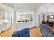 Open-concept view of kitchen with island, pendant lighting, and adjoining dining area at 6647 Gaywind Dr, Charlotte, NC 28226