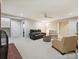 Spacious living room with neutral tones, plush seating, and a modern design at 6647 Gaywind Dr, Charlotte, NC 28226