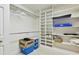Organized walk-in closet with white shelving units, providing plenty of storage space at 6647 Gaywind Dr, Charlotte, NC 28226