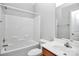 Well-lit bathroom featuring a tub, shower, toilet, and vanity with modern fixtures at 6705 E Douglas Park Dr, Huntersville, NC 28078