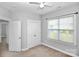 Bright bedroom with a window, closet, and ceiling fan at 6705 E Douglas Park Dr, Huntersville, NC 28078