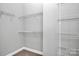Walk-in closet with built-in shelving offering ample storage space at 6705 E Douglas Park Dr, Huntersville, NC 28078