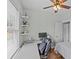 Bedroom featuring a desk area with computer setup, decorated walls and shelves, and ample natural light at 6827 Dunton St, Huntersville, NC 28078