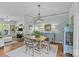 Open concept living space with an eat-in kitchen and view to the living area at 6827 Dunton St, Huntersville, NC 28078