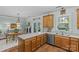 Bright eat-in kitchen featuring stainless appliances, a window over the sink, and seating area at 6827 Dunton St, Huntersville, NC 28078