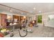 Spacious living room with gray vinyl flooring and natural light, ready for renovation at 6934 Lockhart Rd, Sharon, SC 29742