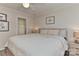 Comfortable bedroom features a queen-sized bed, ceiling fan, and closet for ample storage space at 705 Moss Creek Dr, Matthews, NC 28105