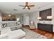 Inviting living room with wood floors, stylish rug, and modern furnishings at 705 Moss Creek Dr, Matthews, NC 28105