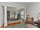 Open-concept living area with dining and sitting spaces, providing an inviting and connected atmosphere at 705 Moss Creek Dr, Matthews, NC 28105