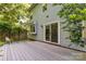 Spacious backyard deck with sliding glass door access to the home's interior at 7226 Reedy Creek Rd, Charlotte, NC 28215