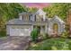 Charming home with a two-car garage, manicured lawn, and mature landscaping, offering great curb appeal at 7226 Reedy Creek Rd, Charlotte, NC 28215