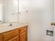 Clean half bathroom with a vanity and a neutral color scheme at 7226 Reedy Creek Rd, Charlotte, NC 28215