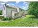 Extensive backyard with a patio, grill, and ample green space at 10322 Stoneykirk Ln, Charlotte, NC 28269