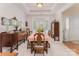 Inviting dining room with bay window and space for a large table and buffet at 10322 Stoneykirk Ln, Charlotte, NC 28269