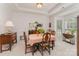 Traditional dining room with tray ceiling, and large window providing natural light at 10322 Stoneykirk Ln, Charlotte, NC 28269