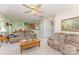 Comfortable living room area featuring neutral carpet and warm beige walls at 10322 Stoneykirk Ln, Charlotte, NC 28269