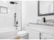 Bathroom featuring a tub and shower, white cabinets and walls, and a granite countertop vanity at 104 Arbor Dr, Waxhaw, NC 28173