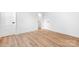 Bedroom area features hardwood flooring, neutral walls, and bright white trim at 104 Arbor Dr, Waxhaw, NC 28173
