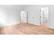 Bedroom area features hardwood flooring, neutral walls, and bright white trim at 104 Arbor Dr, Waxhaw, NC 28173